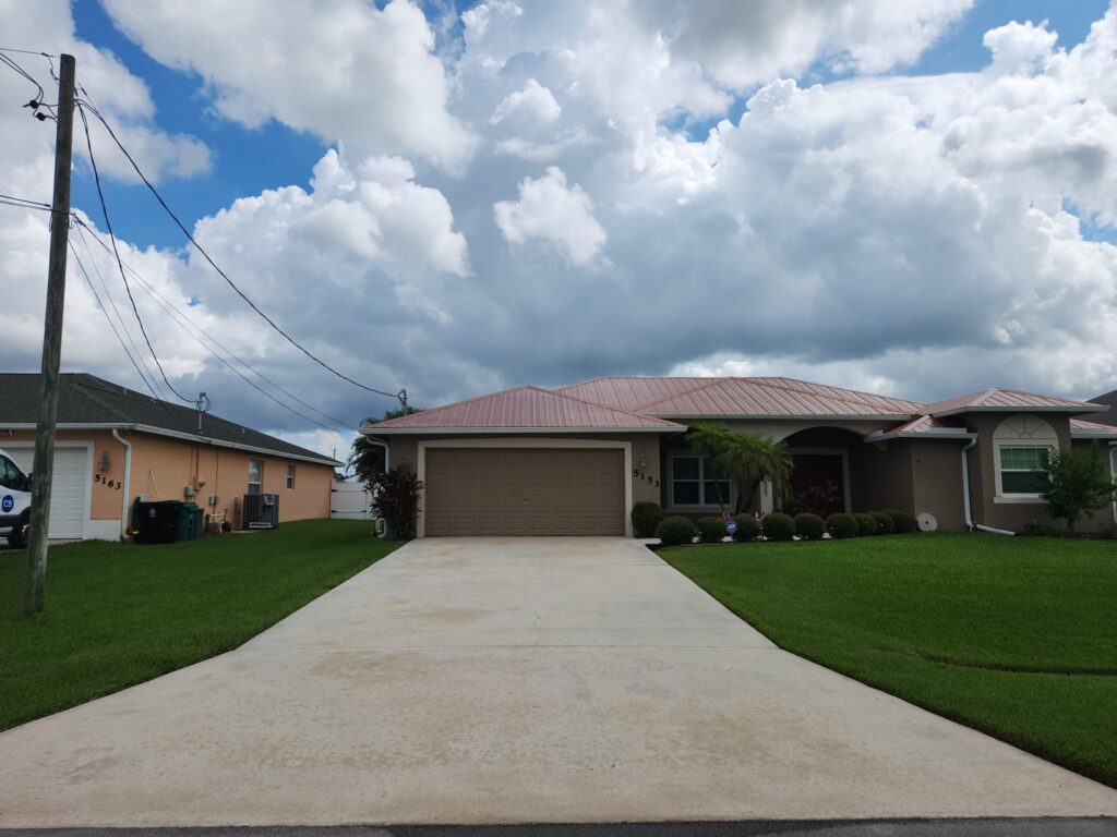 A wide shot of a clean garage driveway